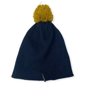 Spacecraft navy blue marigold with yarn tie pompom knit beanie gently used